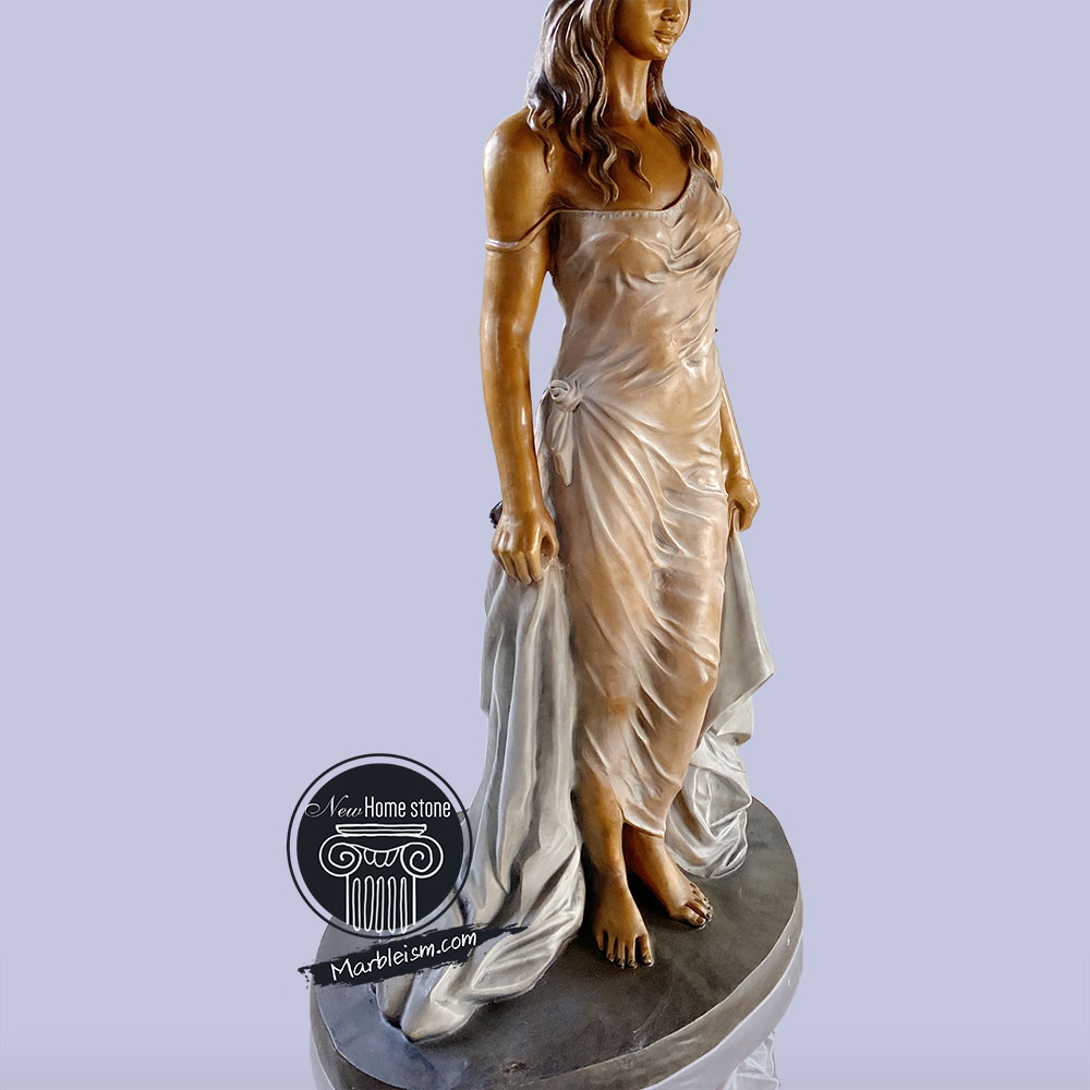  bronze statue of women wearing transparent skirt